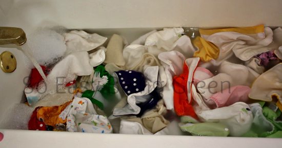 cloth diapers in bath tub with rockin green cloth diaper detergent