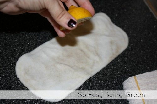 squeezing lemon juice on cloth diaper insert to get rid of cloth diaper stains