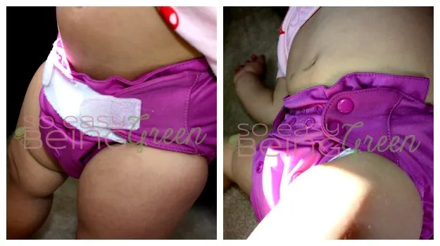 child wearing aplix cloth diapers and snap cloth diaper