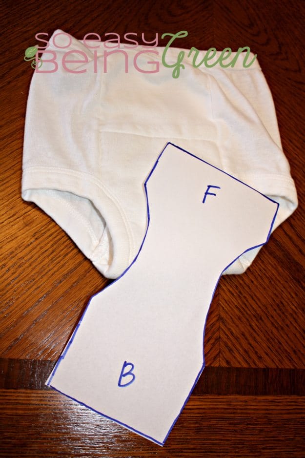 white cloth training pants with paper pattern labeled F and B