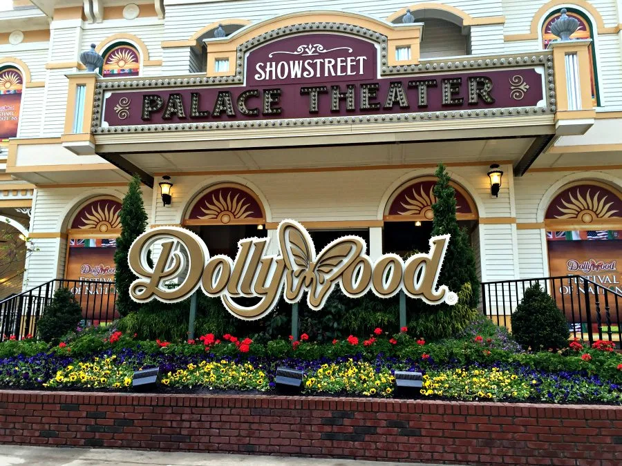 Dollywood sign, flowers, in front of building