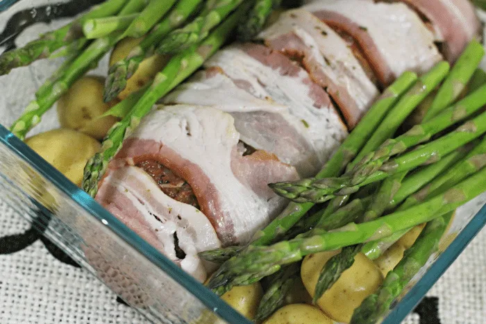 ready to bake one pan meal with bacon wrapped Smithfield pork tenderloin and fresh vegetables
