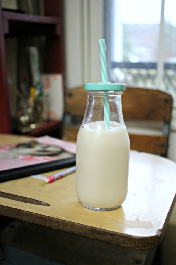 almond milk in glass milk jar
