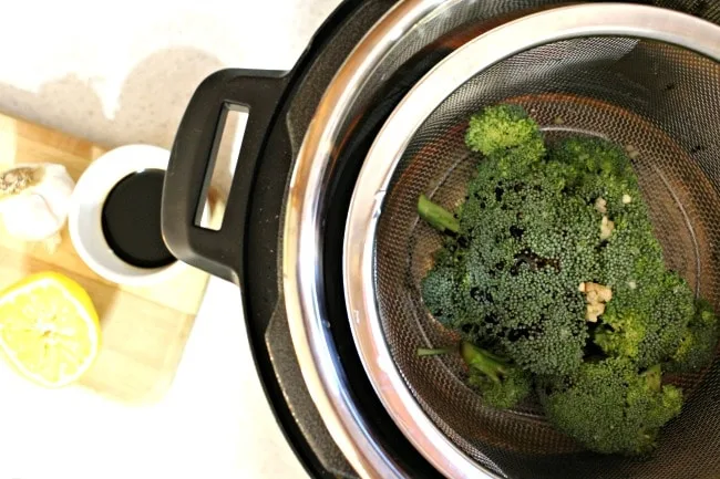 Steamed broccoli in Instant Pot with soy sauce lemon and garlic