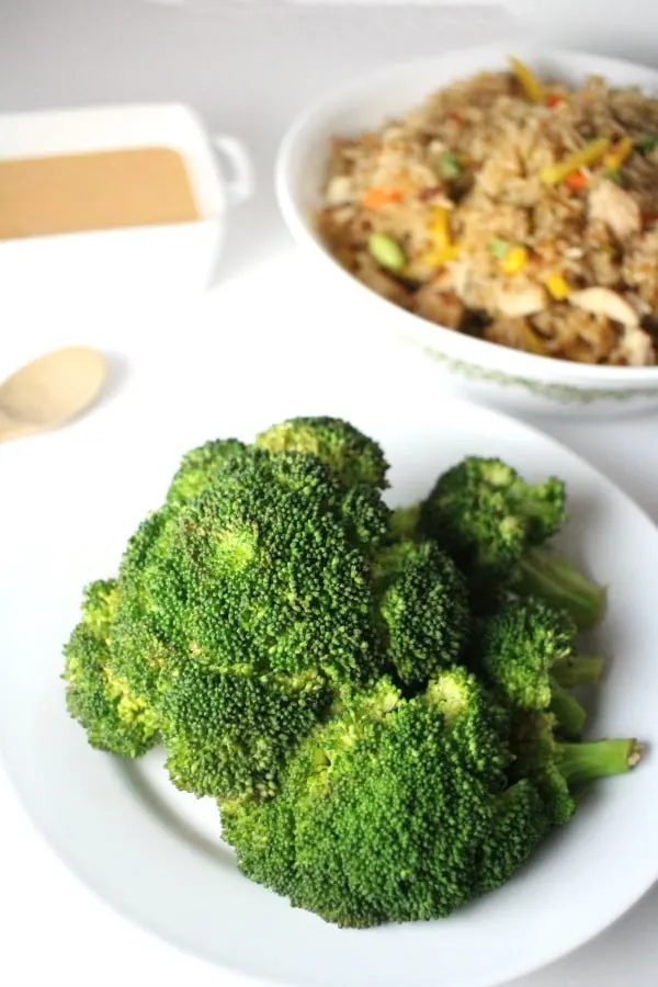  Broccoli steamed in white bowl with rice
