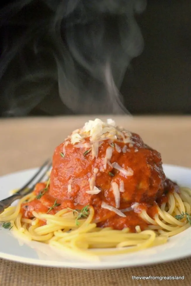 Spaghetti recipe - giant meatball on a plate of pasta