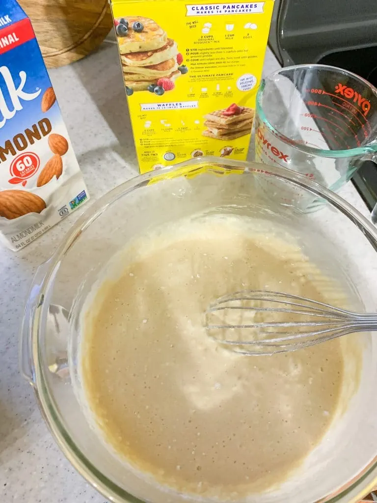 whisk in bowl of pancake mix